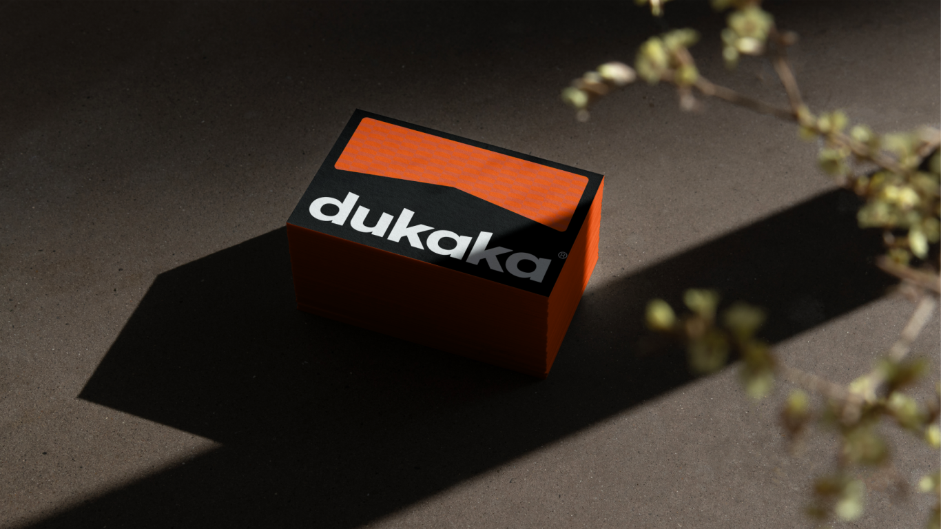 杜卡卡DUKAKA — 极简成衣品牌形象设计图9